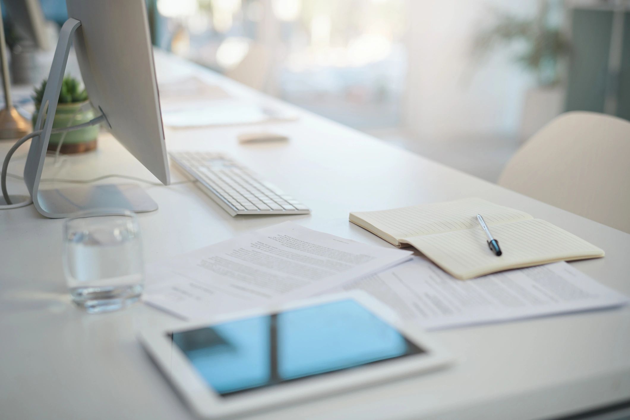 Shipping documents and paperwork on a modern office desk