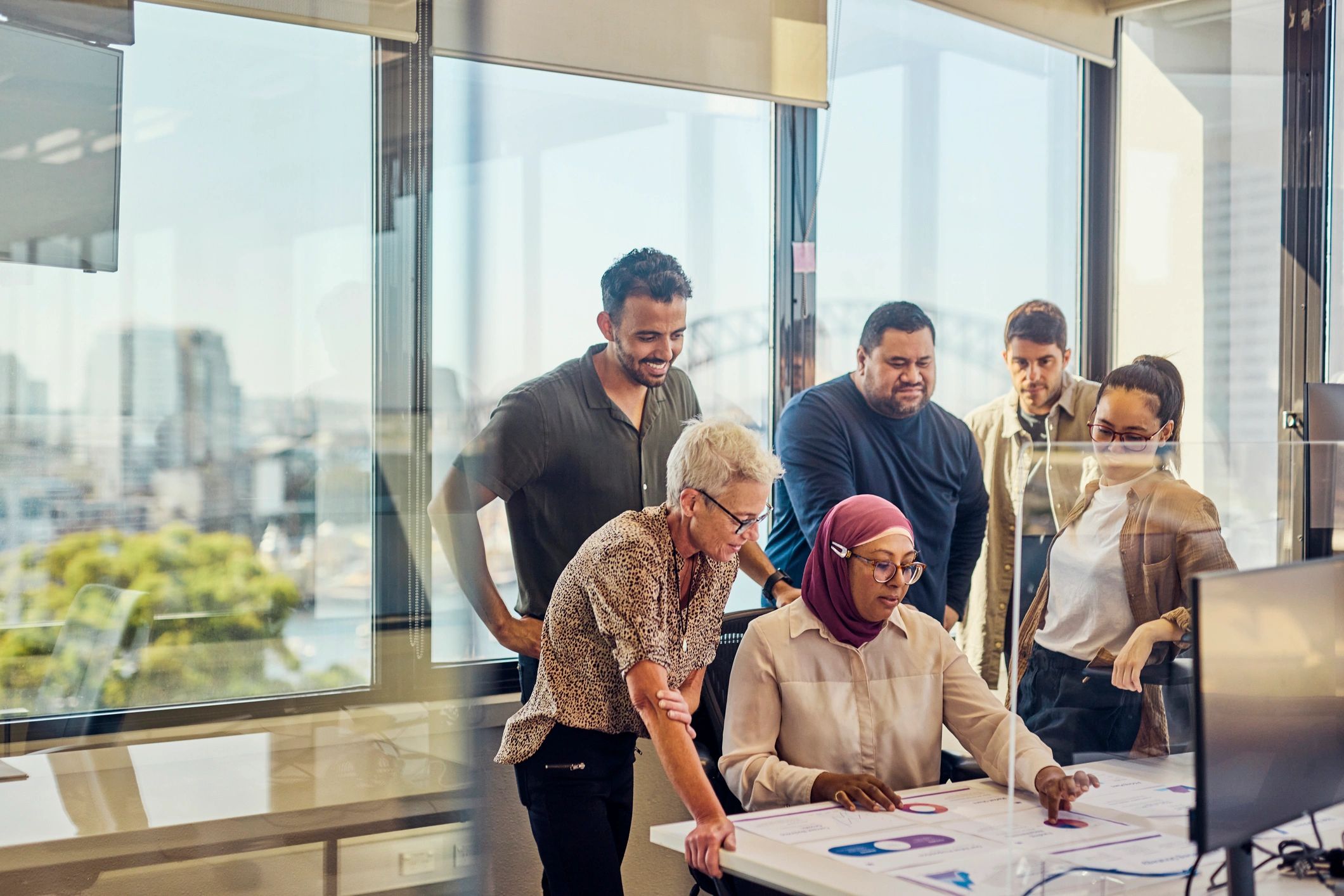 Operations team collaborating in an office meeting